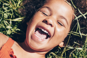 a laughing child demonstrates why laughter is important for children