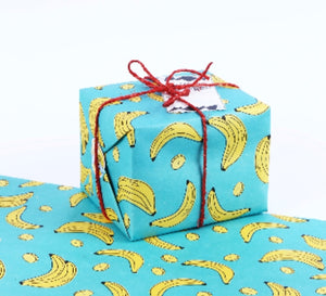 present and wrapping paper teaching compassion to kids for the holidays